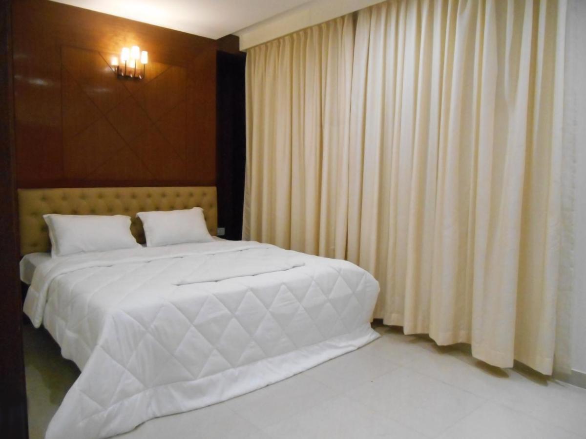 The Grand Coral Hotel Bangalore Buitenkant foto